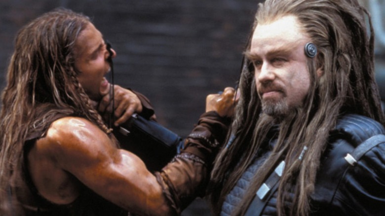 Barry Pepper being strangled by John Travolta in Battlefield Earth