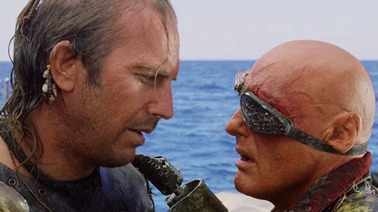 The Mariner (Kevin Costner) standing close to Deacon (Dennis Hopper) in "Waterworld."