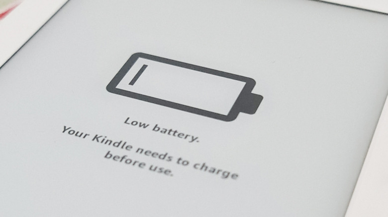 A close-up of a low battery warning on a Kindle reader.