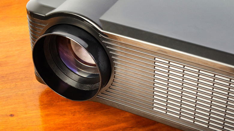 An LED projector set up on a table.