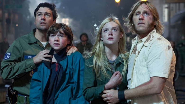 Kyle Chandler, Ron Eldard, Elle Fanning, and Joel Courtney in Super 8