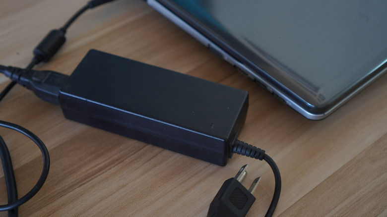 Notebook laptop with charger and box