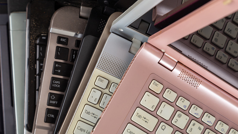 laptops stacked on top of each other