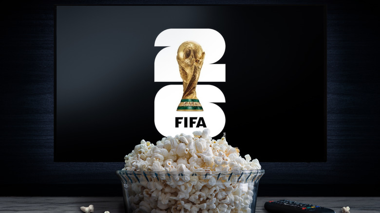 The FIFA logo displayed on a screen behind a bowl of popcorn