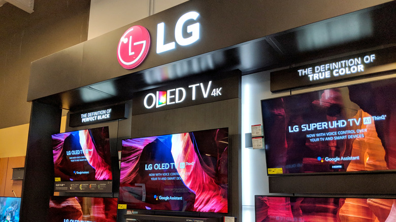 A display of LG OLED TVs in a store.