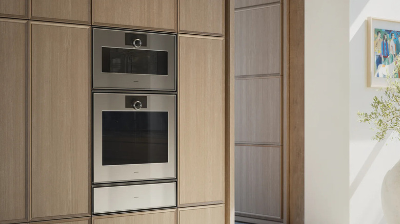 Wall oven units in modern upscale kitchen