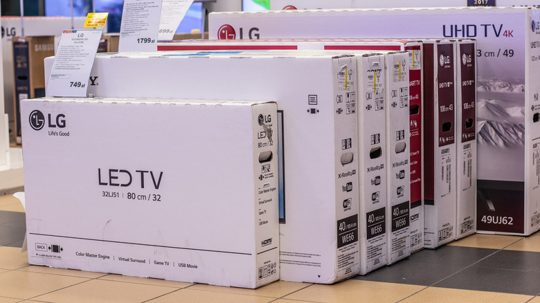 LG TVs of different sizes packed in boxes