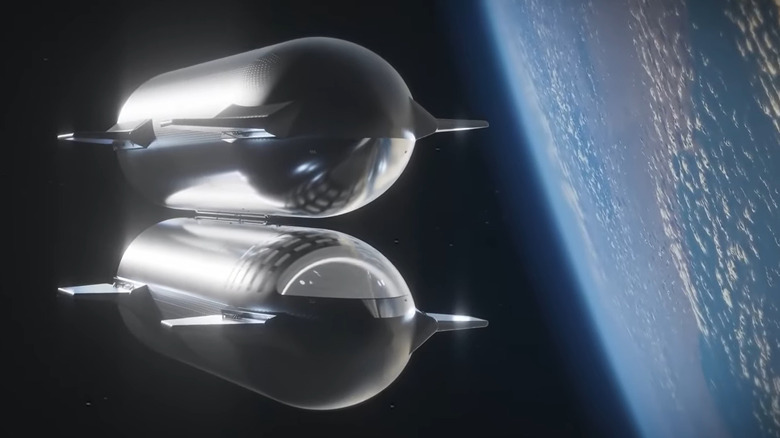 SpaceX Starships refueling while in orbit with Earth in the background