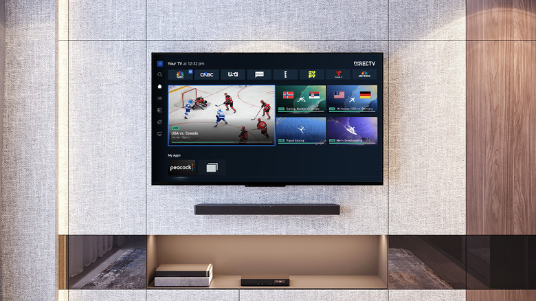 Wall mounted TV running the Direc TV interface