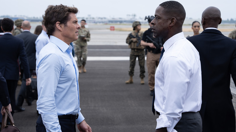 James Marsden and Sterling K. Brown facing each other in Paradise