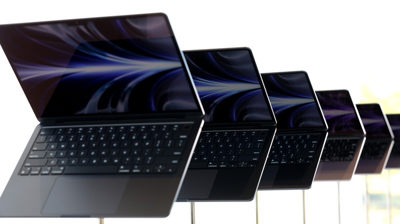 redesigned MacBook Air laptops are seen displayed during the WWDC22 at Apple Park