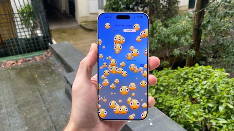 An iPhone displaying the new distorted face emoji