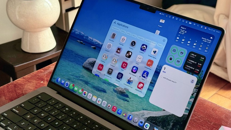 macOS Tahoe's new Spotlight running on the M1 Pro MacBook Pro