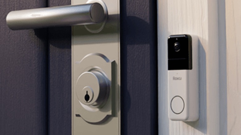 Roku video doorbell next to door outside house