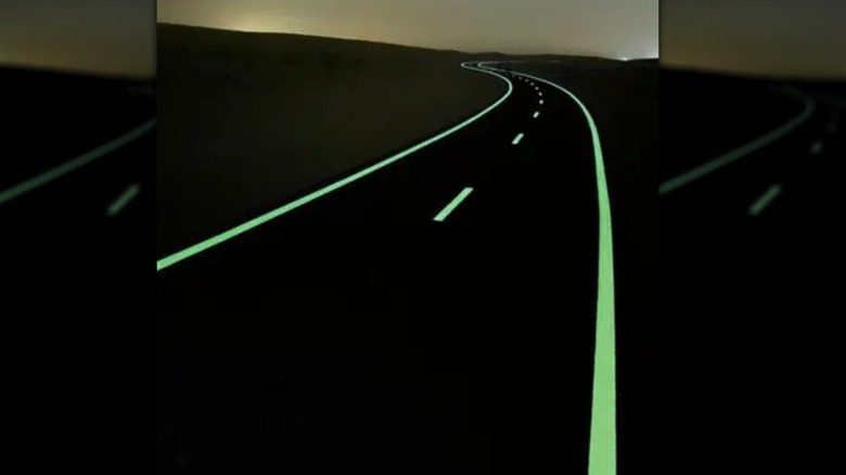 Photoluminescent paint on a road at night