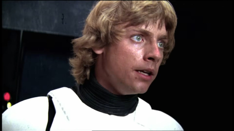 A close up of Mark Hamill as Luke Skywalker in a stormtrooper outfit