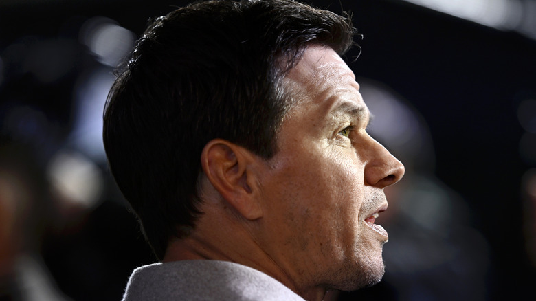 Mark Wahlberg seen side profile, attending a movie premiere.