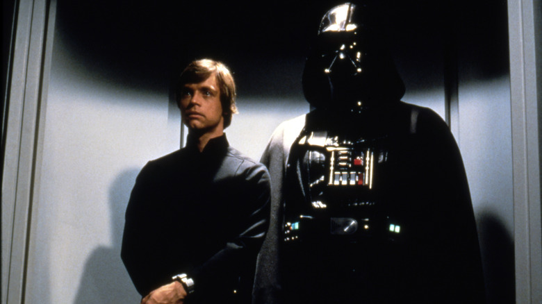 Luke Skywalker with Darth Vader in a scene from Star Wars