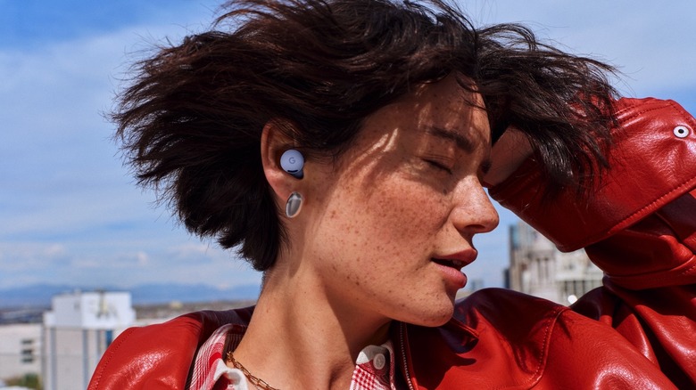 A person using the new Pixel Buds 2a wireless earphones.