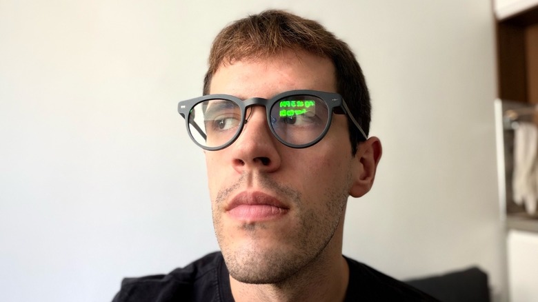 Close-up shot of a man wearing smart glasses