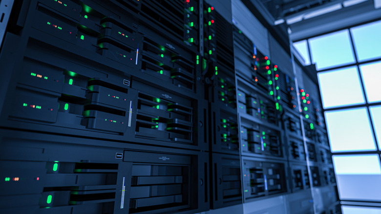 Close up of tower servers in a massive data center.
