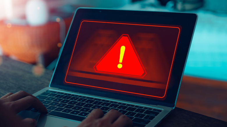 A cyberattack warning on a PC.