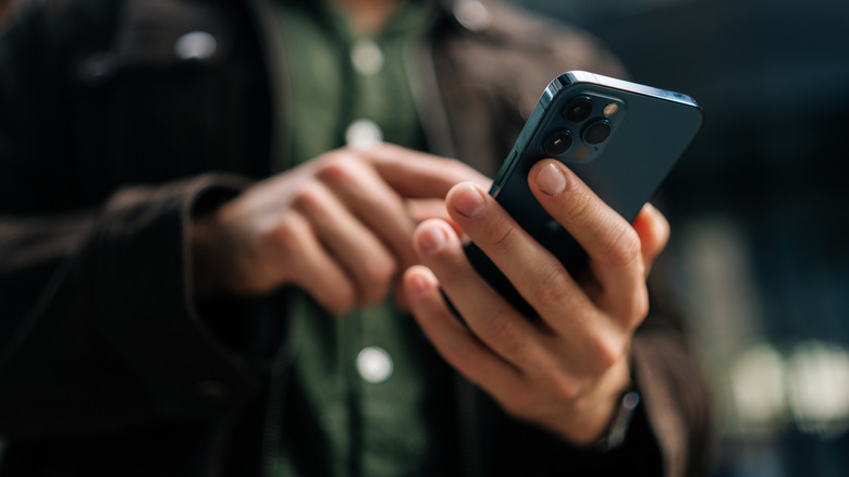 Closeup of person holding smartphone