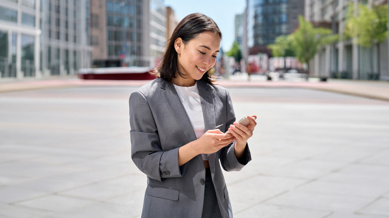 Woman using a smartphone outdoors