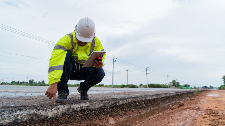 A researcher studying an asphalt road
