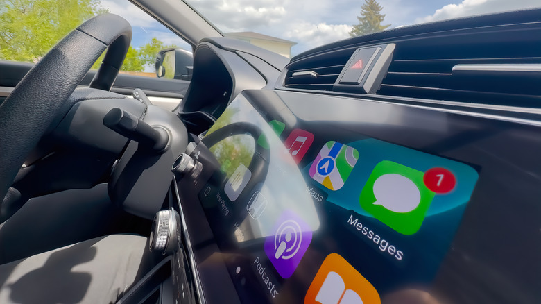 Apple CarPlay being displayed on a car's infotainment screen.