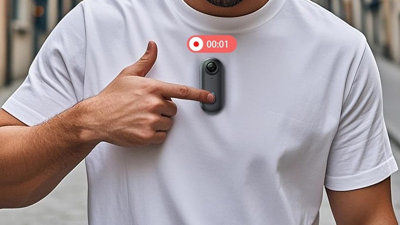 Wearable body camera on a person's shirt as they start the recording