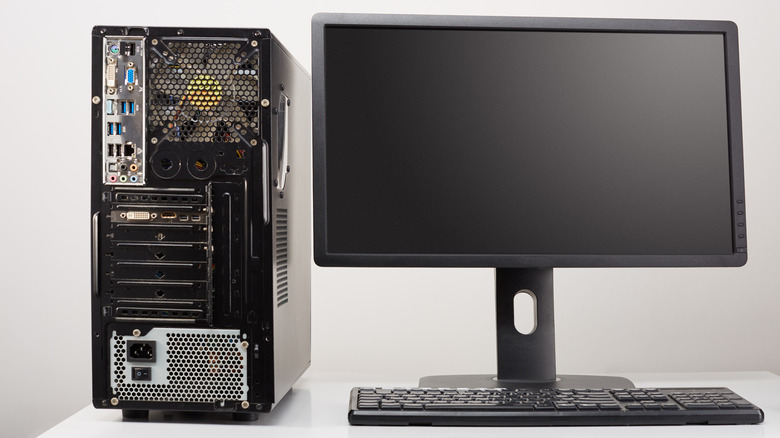 a back profile image of MSI PRO 16T Series showing both ethernet ports being used in a retail environment