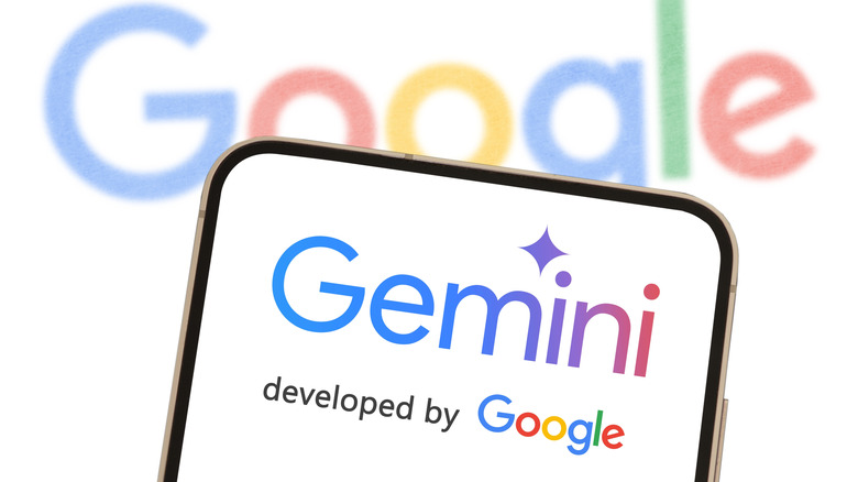 The Gemini logo on a smartphone display, and the Google logo in the background.