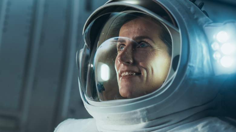 female astronaut in space suit