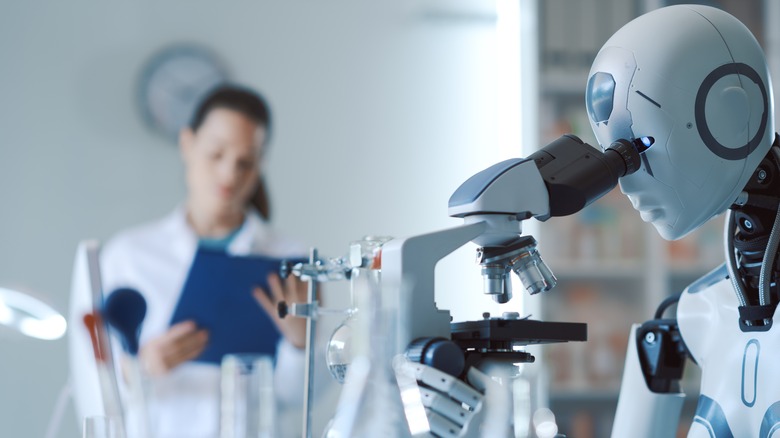 Scientist and AI robot working in science lab