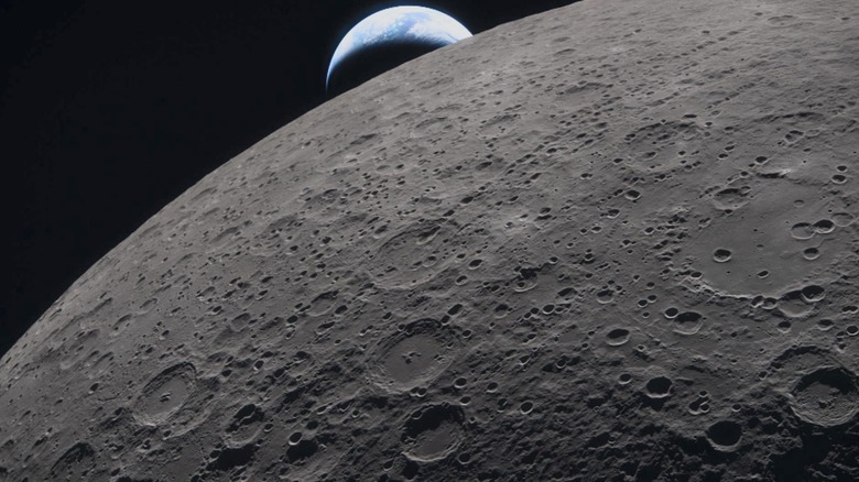 Picture of the Earth behind the moon from the Artemis II rocket mission