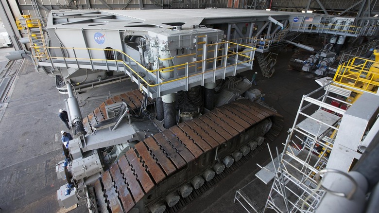 NASA's massive crawler-transporter 2 sits in the Vehicle Assembly Building in the Kennedy Space Center.