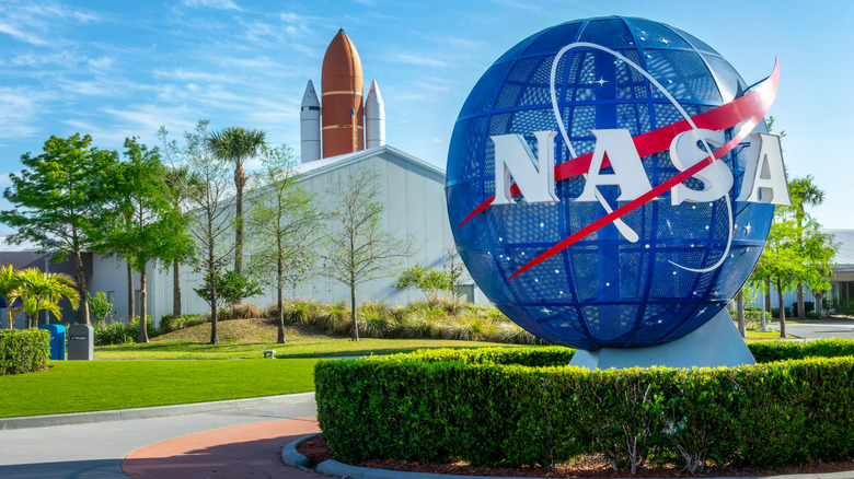 NASA logo on a globe statue