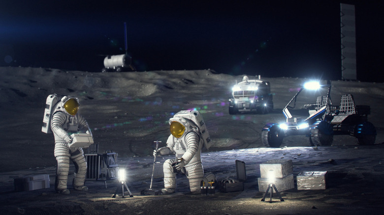 An artists' rendering shows astronauts in space suits erecting camps on the lunar surface.