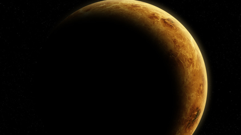 A photo of the planet Venus, mostly in shadow