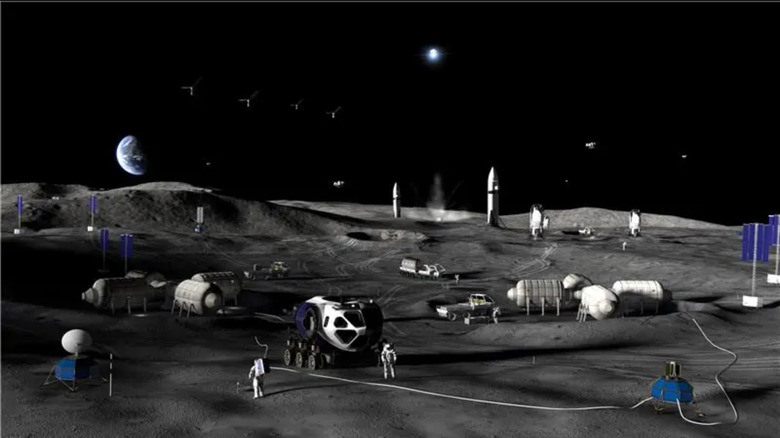 An artists' rendering of NASA's future lunar base shows astronauts, generators, spaceships, and habitation pods on the moon's surface