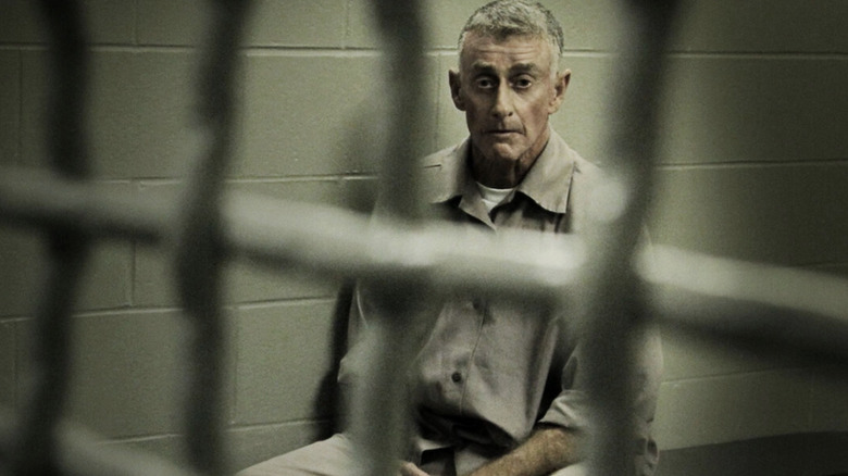 Michael Peterson sitting behind bars