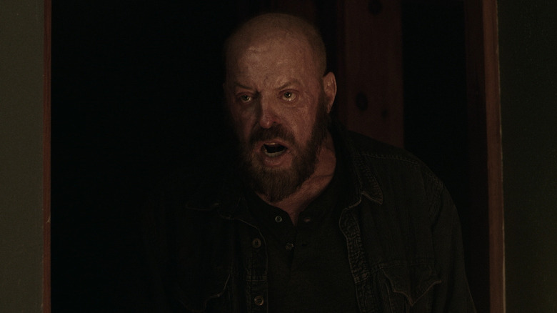 Tom (Neville Archambault) standing in the dark in "The Block Island Sound."
