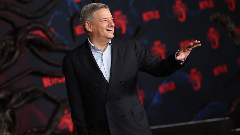 Netflix CEO Ted Sarandos waves to fans at the Stranger Things Season 5 premier.