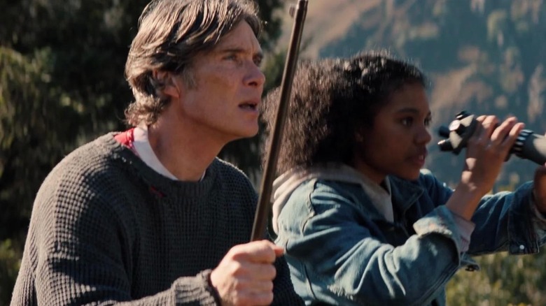 Jim (Cillian Murphy) and Sam (Maiya Eastmond) looking down from a hill in 28 Years Later: The Bone Temple