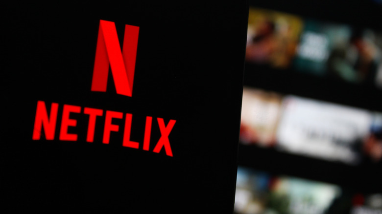 Netflix running on a smartphone with the Netflix homescreen in the background