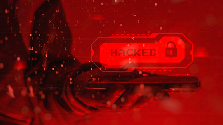 A red graphic shows a man holding a phone with binary code and a "HACKED" symbol hovering over its screen
