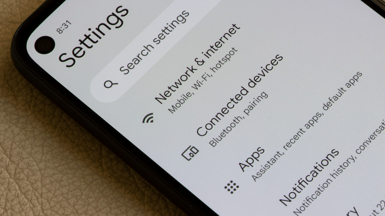 A close up of an Android phone with Settings app