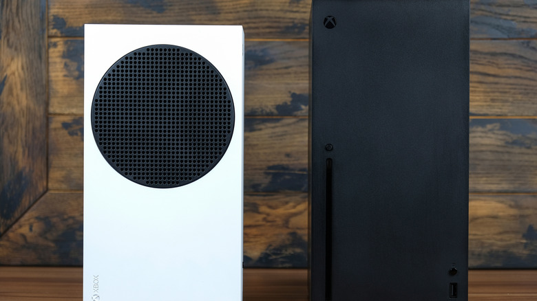 The Xbox Series S and Series X consoles on a clean surface