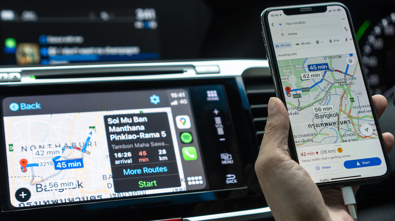 Google Maps on an iPhone with CarPlay in the background